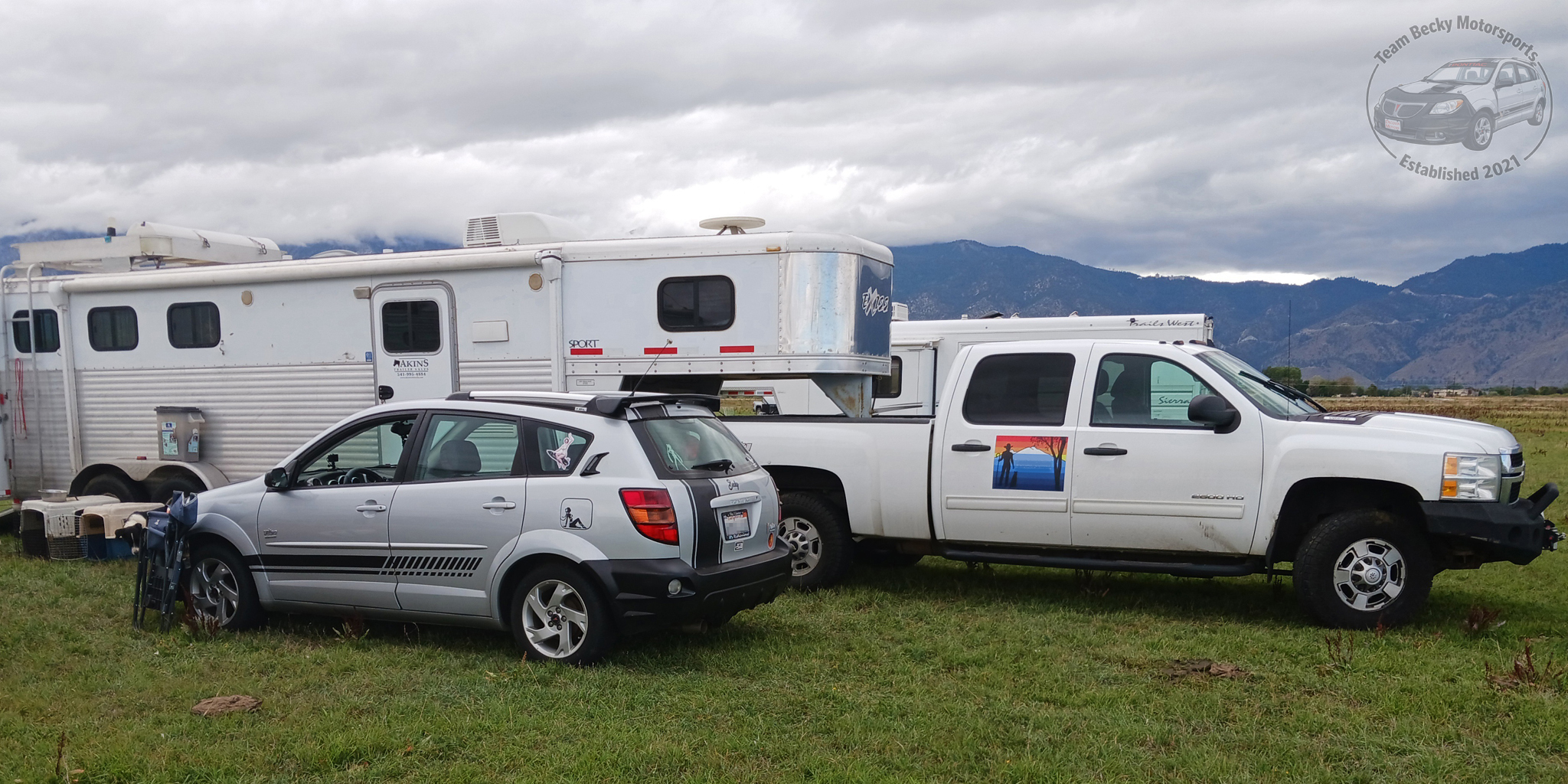 Becky's first out-of-state journey, to a dog trial outside of Reno, NV. Here she is parked in a cow pasture next to our friend's truck.