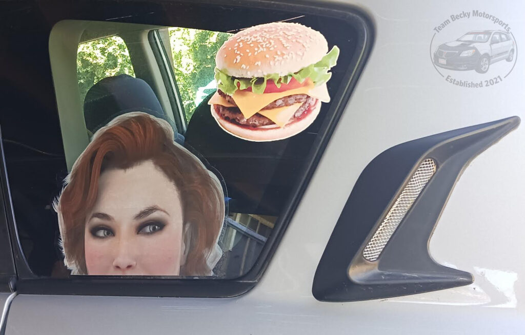 Bombshell Becky makes another appearance, near the ubiquitous cheeseburger
